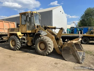 Аренда колесного погрузчика АМКОДОР 342С и самосвалов (20-30 тонн)