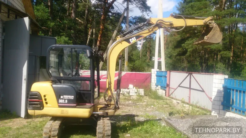 Аренда мини-экскаватора Caterpillar 302.5 с гидромолотом и буром