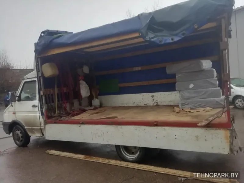 Грузоперевозки тентованным фургоном Iveco 3 т (25 м³, до 6 метров)