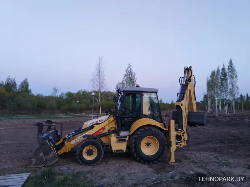 Аренда New Holland и фронтального погрузчика Амкодор 342С4 (4 т)