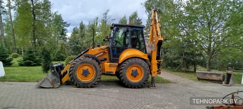 Аренда экскаватора-погрузчика New Holland LB115B и спецтехники