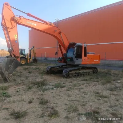 Аренда гусеничного экскаватора с планировочным ковшом 24/7