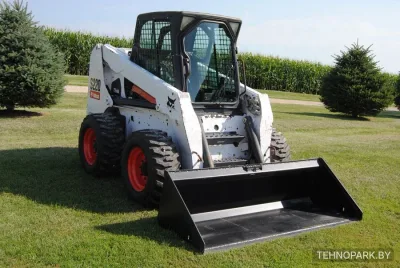 Аренда минипогрузчика Bobcat S205 с ямобуром и гидромолотом
