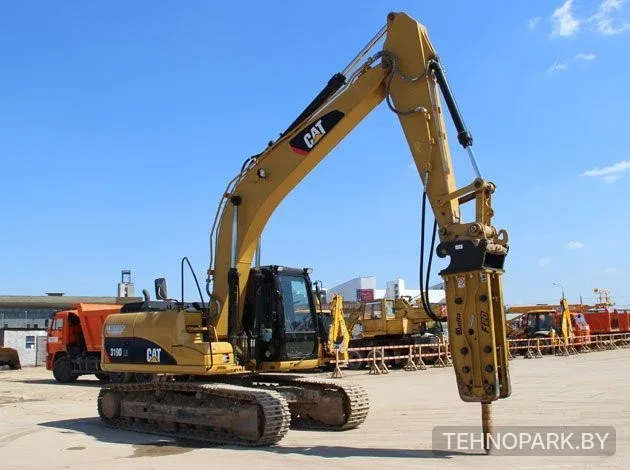 Аренда экскаватора CAT 325 с гидромолотом и гидроножницами