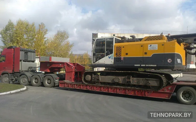 Аренда тяжелых низкорамных тралов от 40 до 80 т и парка спецтехники в Минске