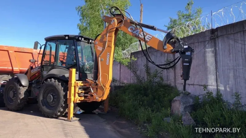 Аренда нового Case 695SV с гидромолотом Indeco и буром до 6 м