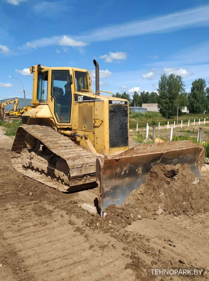 Аренда бульдозеров-болотоходов CAT и Komatsu с поворотными отвалами