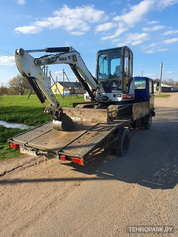 Аренда мини-экскаватора Bobcat 331 с экипажем (глубина 3 м)