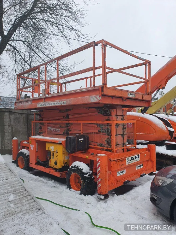 Аренда дизельного ножничного подъемника Holland Lift (21.5 м) 4x4
