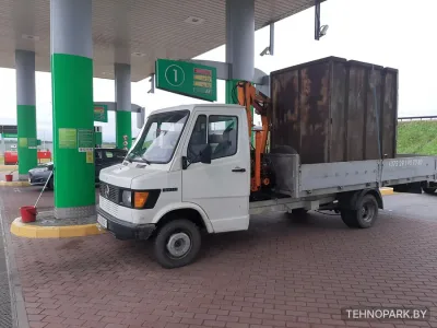 Грузоперевозки бортовым Mercedes 410D с гидроманипулятором (до 2.5 т)