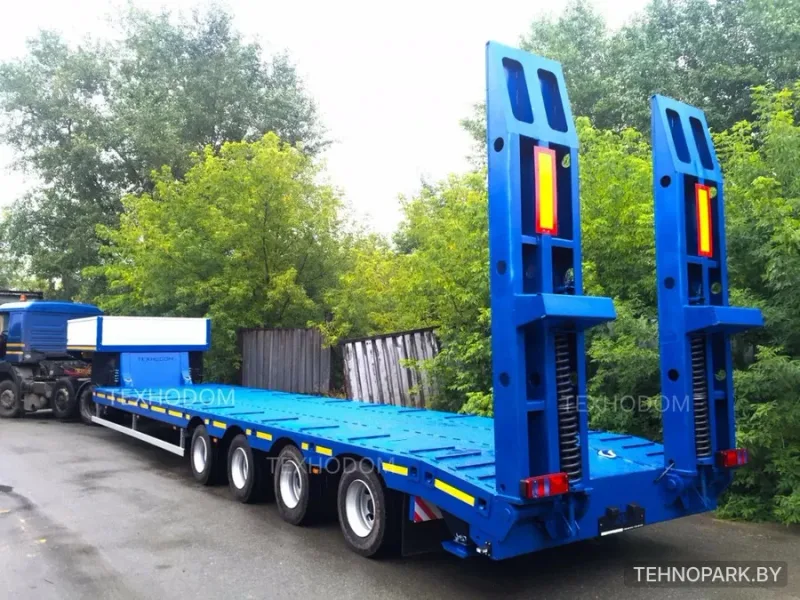Аренда низкорамного телескопического трала 44 т (14 м) и парка тяжелой техники