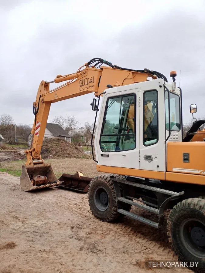 Аренда полноповоротного экскаватора Liebherr 904 с планировочным ковшом