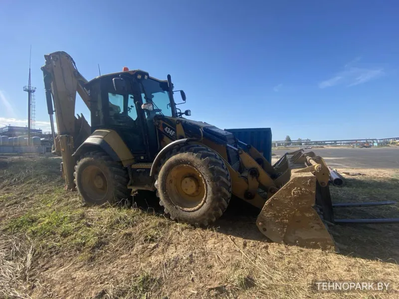 Аренда экскаватора-погрузчика CAT 434 / 444 с гидромолотом 650 кг