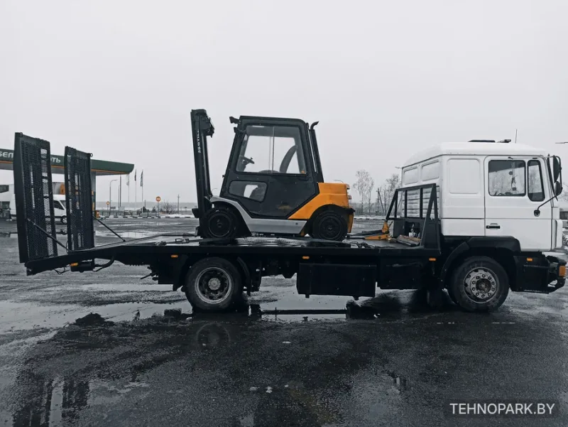 Аренда грузового эвакуатора MAN до 10 тонн с гидроаппарелями и лебедкой