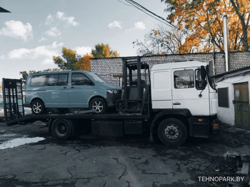 Аренда грузового эвакуатора MAN до 10 тонн с гидроаппарелями и лебедкой