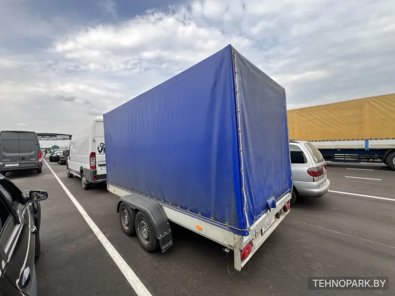 Аренда двухосного тентованного прицепа 2 тонны (14.8 м³) под категорию Е