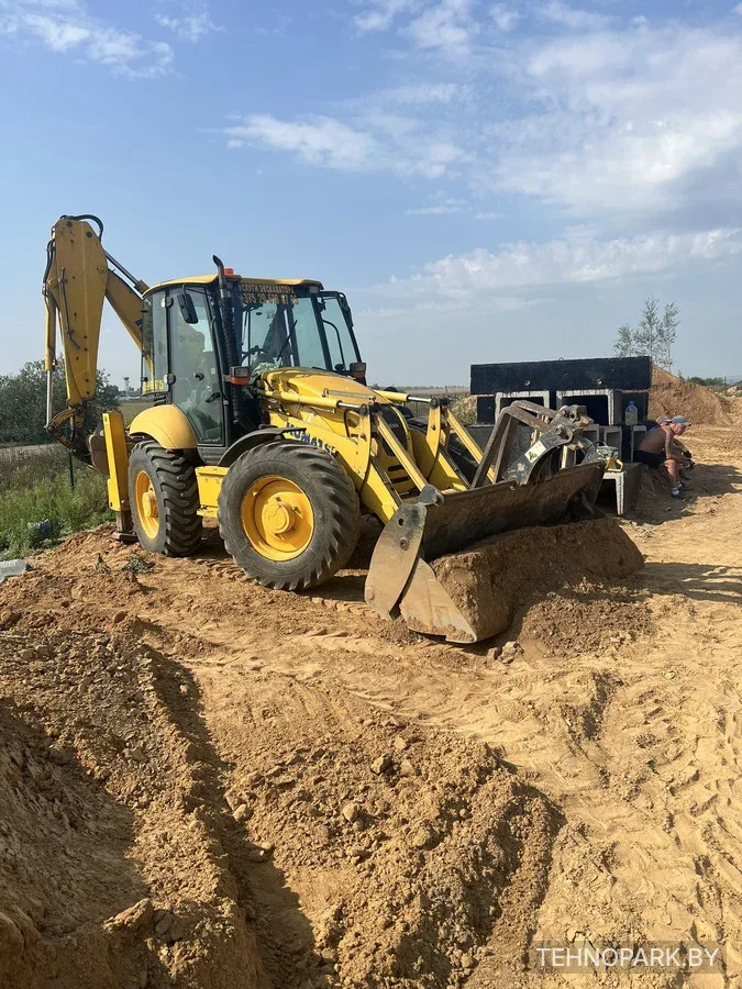 Аренда тяжелого равноколесного экскаватора Komatsu WB93S-5 (без посредников)