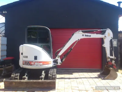 Аренда мини-экскаватора Bobcat 430 (4 т, нулевой занос) с быстросъемом