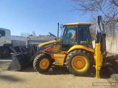 Аренда экскаватора-погрузчика Volvo BL-71 с челюстным ковшом «4 в 1»